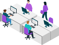 Open-plan office with staff working at computers and collaborating at shared desks.
